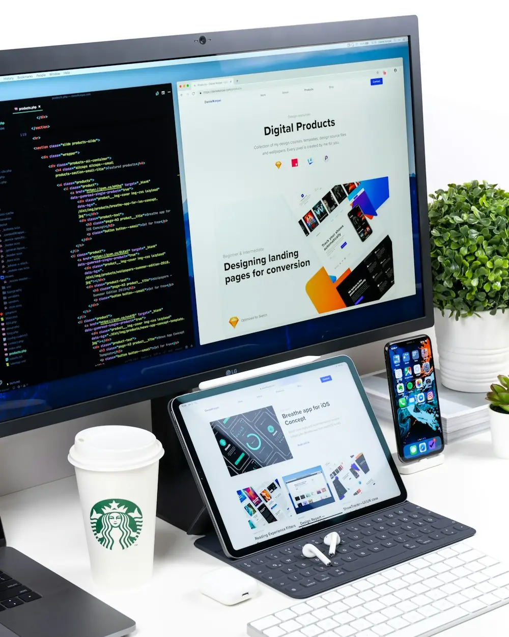 Monitor and tablet showing website designs